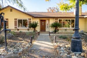 a house with a street light in front of it at Magic Sequoia Spacious Home in Three Rivers