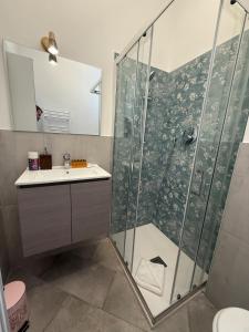 a bathroom with a shower and a sink at House - Cesare Balbo - Too in Rome +14 photos