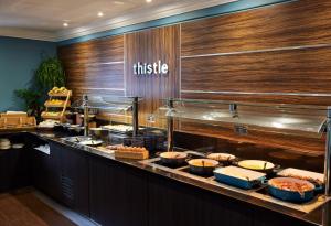 a buffet line with many food items on at Thistle Trafalgar - Leicester Square in London +19 photos
