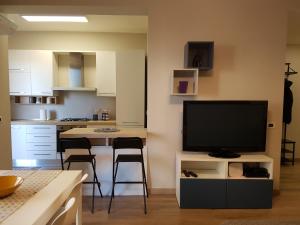 Η κουζίνα ή μικρή κουζίνα στο Camera in zona Ospedale e centro a Reggio Emilia