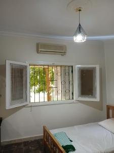 Postel nebo postele na pokoji v ubytování Apartment in Sheikh Zayed, Giza