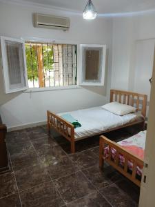 Postel nebo postele na pokoji v ubytování Apartment in Sheikh Zayed, Giza