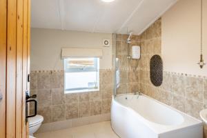 Vannituba majutusasutuses 4 Harbour View +21 fotot