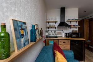 Η κουζίνα ή μικρή κουζίνα στο Markos Wooden Loft