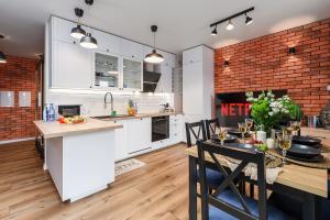 Køkken eller tekøkken på Lumina luxury apartment with parking