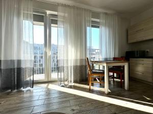 Kuchyň nebo kuchyňský kout v ubytování Zakładowa Apartment - Balkon & Lift