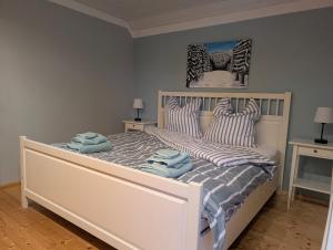 En eller flere senge i et værelse på Cozy Winterwunderland Langlauf, Biking 4 Personen