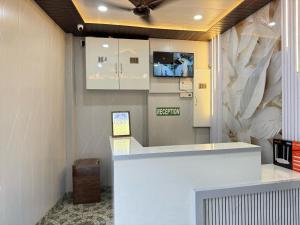 TV a/nebo společenská místnost v ubytování Hotel O Kanha Paying Guest House