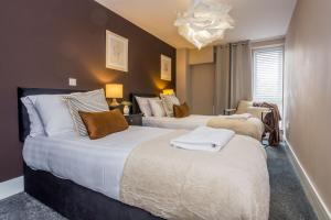 Ένα ή περισσότερα κρεβάτια σε δωμάτιο στο Parsons House