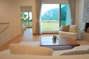 Postel nebo postele na pokoji v ubytování Valley View Villa Songkhon - 3BR Pool Paradise + 19 fotografií