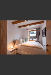 Ένα ή περισσότερα κρεβάτια σε δωμάτιο στο Haus Huber Sonnenhofweg