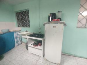 Kuchyň nebo kuchyňský kout v ubytování Apartment in the city center of Jardim + 1 fotografie