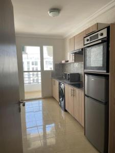 Kuchyň nebo kuchyňský kout v ubytování Beach Homes Iska