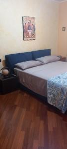 Postel nebo postele na pokoji v ubytování La Perla del Naviglio