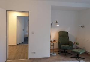 Posezení v ubytování Rotkehlchen Ferienwohnung + 3 fotografie