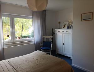 Postel nebo postele na pokoji v ubytování Rotkehlchen Ferienwohnung