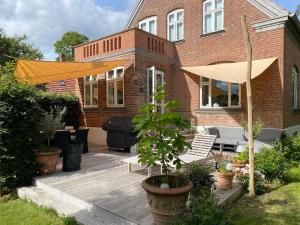 Zahrada ubytování Din egen villa, spa, ude bruser, have & elbil-lader