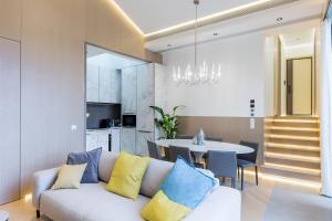 Posezení v ubytování Ravissant loft avec une belle terrasse