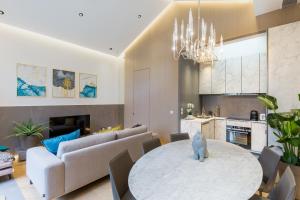 Kuchyň nebo kuchyňský kout v ubytování Ravissant loft avec une belle terrasse