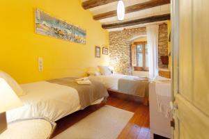 Postel nebo postele na pokoji v ubytování Can Sisó, Alojamiento por habitaciones + 44 fotografií