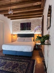 Postel nebo postele na pokoji v ubytování Casanova Hideaway