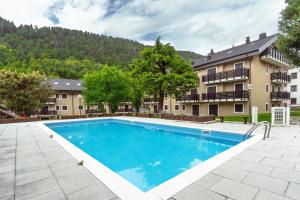 Bazén v ubytování Lo Smeraldo by Ca-Sa Check nebo v jeho okolí