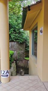a side view of a house with a building at 12A NEST Chatswood in Sydney