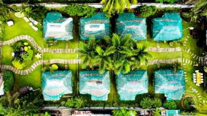 an overhead view of a resort with swimming pools at Nanay Santa's Garden Beach Resort in Gumubat