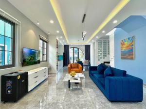 Posezení v ubytování MYSTERY HOME - 180m2 3BEDROOM - NOVAWORLD PHAN THIET + 15 fotografií