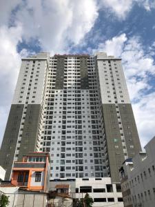 a large tall building with a sky at DN property in Bandung +10 photos