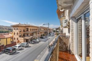 a view of a city street from a building at Rincón de Bruno y Duque in Cenes de la Vega