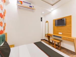 Φωτογραφία από το άλμπουμ του Hotel O Mahi Inn στο Αχμενταμπάντ +19 φωτογραφίες