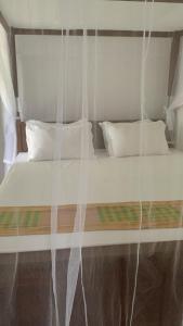 Ένα ή περισσότερα κρεβάτια σε δωμάτιο στο Villa Ranuka