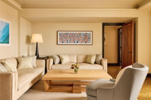 a living room with two couches and a coffee table at Claridge's, Maybourne in London