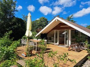 Κήπος έξω από το Naturskønt Sommerhus Ved Jægerspris Strand