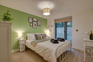 Postel nebo postele na pokoji v ubytování Pobbles Place