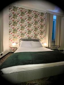 En eller flere senge i et værelse på Dimora Soprana - Affittacamere confortevole