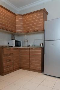 Una cocina o cocineta en Sara Palace Apartments- family only