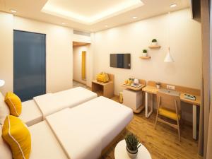 Μια τηλεόραση ή/και κέντρο ψυχαγωγίας στο Bloom Hotel - M Block GK2