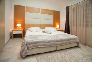 Postel nebo postele na pokoji v ubytování Sdregas Flats