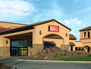 a rendering of a wal mart building at Ramada by Wyndham Des Moines Tropics Resort & Conference Ctr in Urbandale