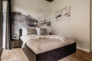 Ένα ή περισσότερα κρεβάτια σε δωμάτιο στο Landscape Cyrhla - LoftAffair Spa Collection