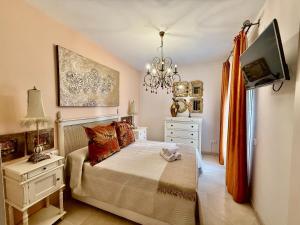 En eller flere senge i et værelse på Sonia Home