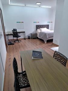 Postel nebo postele na pokoji v ubytování Studio central na cidade do Cristo + 6 fotografií