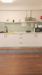 Η κουζίνα ή μικρή κουζίνα στο 12A NEST Chatswood +13 φωτογραφίες