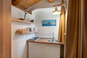 Η κουζίνα ή μικρή κουζίνα στο Appartamenti in Agriturismo