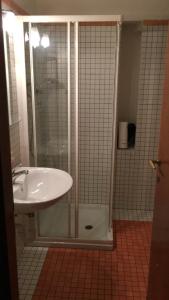 a bathroom with a shower and a sink at Europa House in Padova