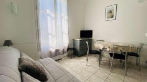 Χώρος καθιστικού στο A proximité du cinéma et du marché, à 150 m de la plage