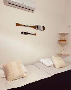 Postel nebo postele na pokoji v ubytování Suíte Privativa com conforto