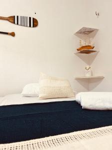 Postel nebo postele na pokoji v ubytování Suíte Privativa com conforto + 6 fotografií